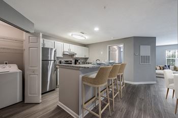 Kitchen and bar with stools